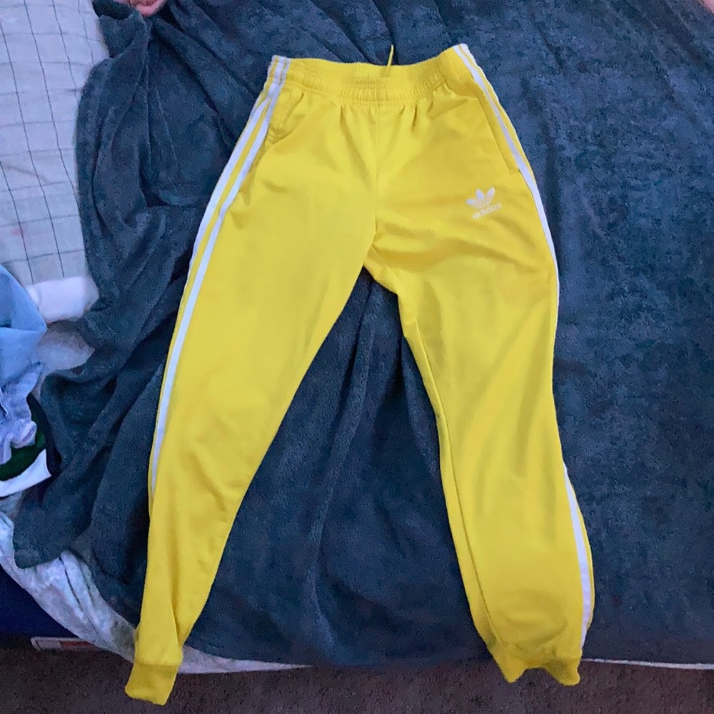 I’m selling yellow Adidas sweats